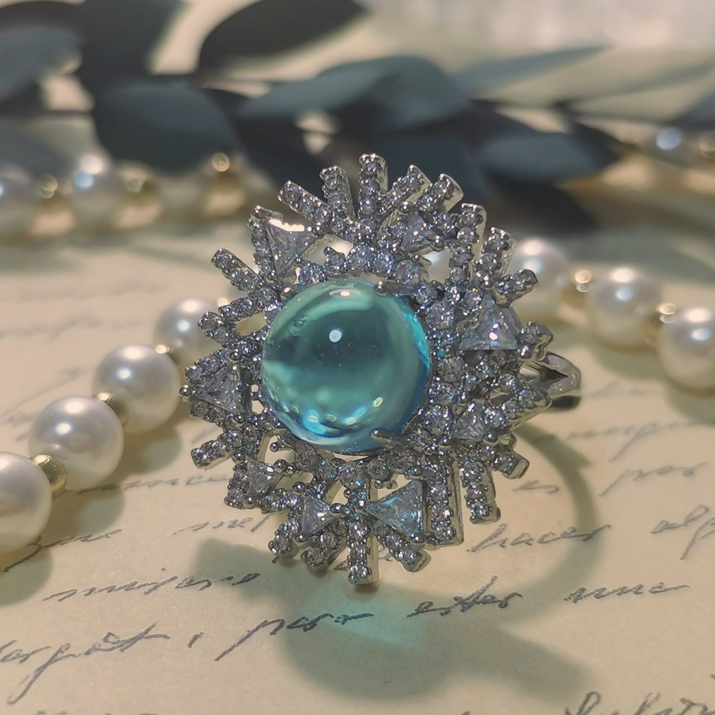 Designer Ring Snowflake Shaped Silver Ring with Spherical Cut Sky Blue CZ