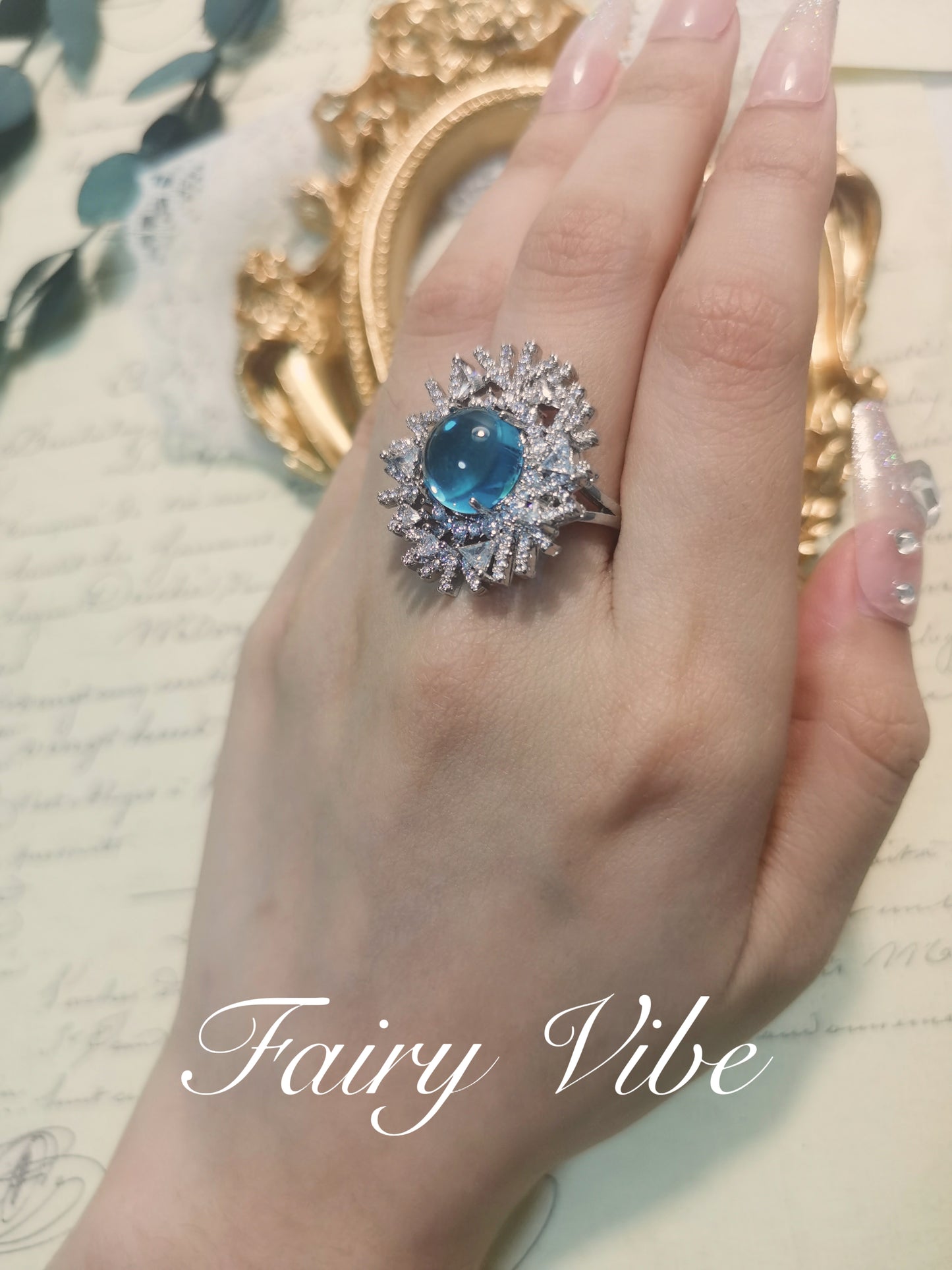 Designer Ring Snowflake Shaped Silver Ring with Spherical Cut Sky Blue CZ